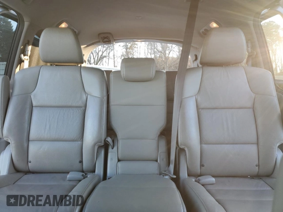 2012 Honda Odyssey Touring with VIN 5FNRL5H9XCB027758, listed as a Copart auction lot 86058504 with 164,860 mi miles and Salvage Title. Bid and sale history available at DreamBid. Image 10.