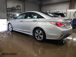 2012 Hyundai Sonata Hybrid with VIN KMHEC4A40CA022676, listed as a Copart auction lot 51004095 with 154,146 mi miles and Salvage Title. Bid and sale history available at carsss.com. Image 2.