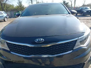 2016 Kia Optima LX with VIN 5XXGT4L36GG105637, listed as a IAAI auction lot 42013800 with 111,836 mi miles. Bid and sale history available at carsss.com. Image 11.