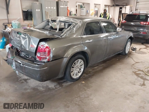 2010 Chrysler 300 Touring with VIN 2C3CA5CV9AH101800, listed as a IAAI auction lot 42015640 with 128,457 mi miles and . Bid and sale history available at DreamBid. Image 4.