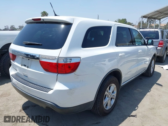 2013 Dodge Durango SXT with VIN 1C4RDHAG0DC669587, listed as a IAAI auction lot 42599143 with 126,748 mi miles and . Bid and sale history available at DreamBid. Image 4.