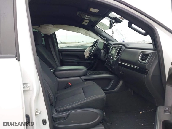 2019 Nissan Titan SV with VIN 1N6AA1E59KN530160, listed as a IAAI auction lot 41557126 with 128,594 mi miles. Bid and sale history available at carsss.com. Image 5.