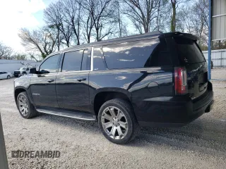 2016 GMC Yukon XL SLT with VIN 1GKS2GKC0GR223832, listed as a Copart auction lot 52250135 with 271,526 mi miles and Salvage Title. Bid and sale history available at carsss.com. Image 2.