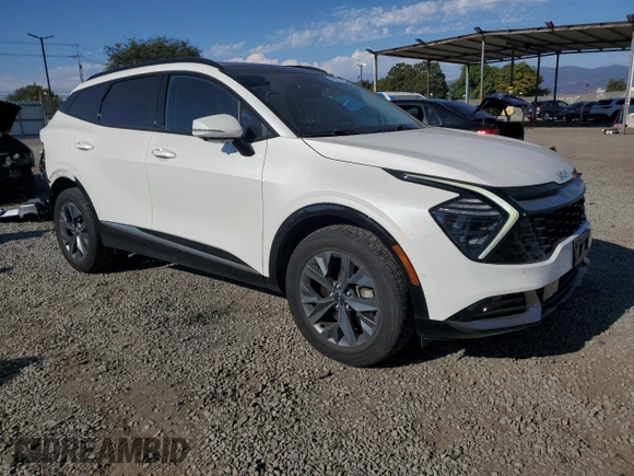 2023 Kia Sportage SX-Prestige with VIN KNDPXCAG8P7019761, listed as a Copart auction lot 63272395 with 22,547 mi miles and Salvage title. Bid and sale history available at DreamBid. Image 4.