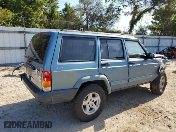 1998 Jeep Cherokee Sport with VIN 1J4FJ68S6WL283022, listed as a Copart auction lot 57451125 with 207,618 mi miles and Salvage title. Bid and sale history available at DreamBid. Image 3.