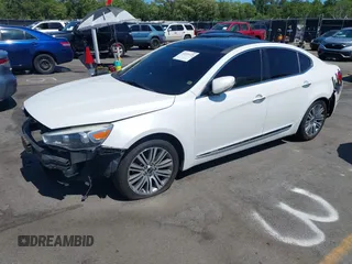 2016 Kia Cadenza Premium z VIN KNALN4D75G5221164, wystawiony jako IAAI lot #42253125 z przebiegiem 200 071 mil mil oraz . Historia ofert i sprzedaży dostępna na DreamBid. Obrazek 2.