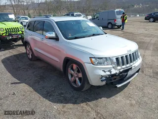 2012 Jeep Grand Cherokee Overland with VIN 1C4RJFCGXCC292257, listed as a IAAI auction lot 41844192 with 182,522 mi miles. Bid and sale history available at carsss.com. Image 1.