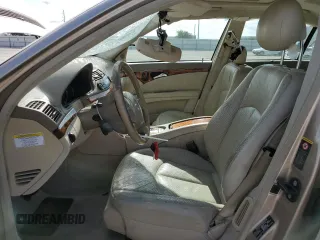 2005 Mercedes-Benz E 500 with VIN WDBUF70J35A696614, listed as a Copart auction lot 54342725 with 147,556 mi miles and Salvage Title. Bid and sale history available at DreamBid. Image 7.