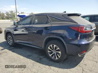 2020 Lexus RX with VIN 2T2AZMAA0LC164766, listed as a Copart auction lot 69867914 with 101,104 mi miles and Salvage Title. Bid and sale history available at carsss.com. Image 2.