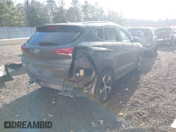 2016 Hyundai Tucson Sport with VIN KM8J33A21GU232747, listed as a IAAI auction lot 41443169 with 111,319 mi miles. Bid and sale history available at carsss.com. Image 4.