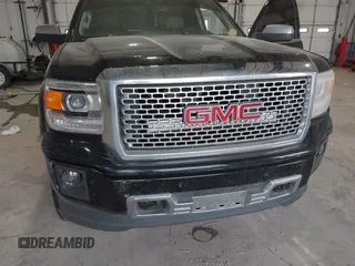 2015 GMC Sierra 1500 Denali z VIN 3GTU2WEJ8FG321045, wystawiony jako IAAI lot #41790541 z przebiegiem 239 945 mil mil oraz . Historia ofert i sprzedaży dostępna na DreamBid. Obrazek 6.