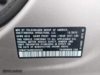 2014 Volkswagen Passat Wolfsburg Ed with VIN 1VWAT7A33EC060225, listed as a IAAI auction lot 41818949 with 163,545 mi miles. Bid and sale history available at carsss.com. Image 9.