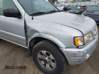 2001 Isuzu Rodeo S with VIN 4S2CK58W614361048, listed as a IAAI auction lot 41681566 with 133,460 mi miles and . Bid and sale history available at DreamBid. Image 6.
