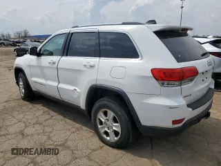 2014 Jeep Grand Cherokee Laredo with VIN 1C4RJFAG4EC119033, listed as a Copart auction lot 54064845 with 321,696 mi miles and Clean Title. Bid and sale history available at DreamBid. Image 2.