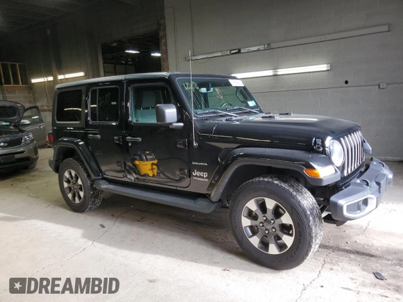 2022 Jeep Wrangler Unlimited Sahara Altitude with VIN 1C4HJXEG0NW115877, listed as a Copart auction lot 80689494 with 30,928 mi miles and Salvage title. Bid and sale history available at DreamBid. Image 4.