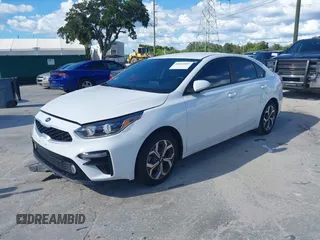 2020 Kia Forte LXS with VIN 3KPF24AD9LE245159, listed as a IAAI auction lot 40423682 with 54,667 mi miles and . Bid and sale history available at carsss.com. Image 2.