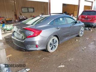 2018 Honda Civic EX-L z VIN JHMFC1F85JX014701, wystawiony jako IAAI lot #41467342 z przebiegiem 50 292 mil mil oraz . Historia ofert i sprzedaży dostępna na DreamBid. Obrazek 4.