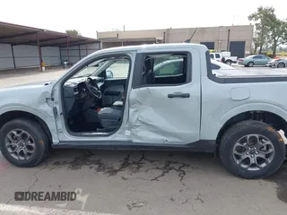 2022 Ford Maverick XL z VIN 3FTTW8E94NRA09230, wystawiony jako IAAI lot #41830226 z przebiegiem 16 422 mil mil oraz . Historia ofert i sprzedaży dostępna na DreamBid. Obrazek 15.