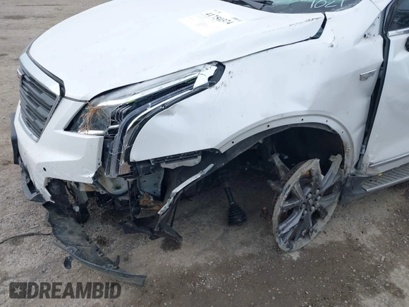 2019 Cadillac XT5 Luxury AWD z VIN 1GYKNDRS2KZ301027, wystawiony jako IAAI lot #41750374 z przebiegiem 44 328 mil mil oraz . Historia ofert i sprzedaży dostępna na DreamBid. Obrazek 19.