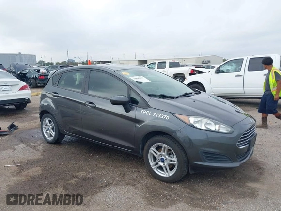 2019 Ford Fiesta SE with VIN 3FADP4EJ7KM159545, listed as a IAAI auction lot 40843810 with 109,578 mi miles. Bid and sale history available at carsss.com. Image 1.
