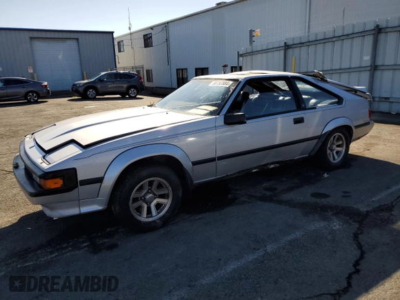 1986 Toyota Supra z VIN JT2MA67L9G0175108, wystawiony jako Copart lot #80793984 z przebiegiem 158 959 mil mil oraz Szkoda całkowita • Salvage title. Historia ofert i sprzedaży dostępna na DreamBid. Obrazek 1.