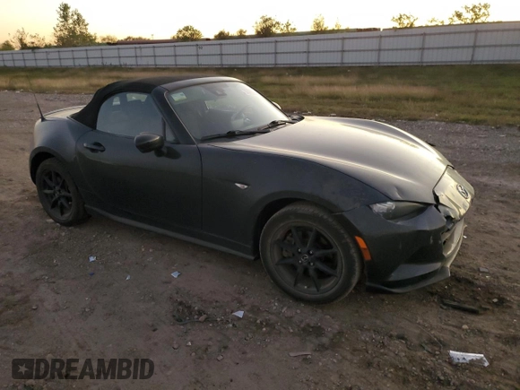 2021 Mazda MX-5 Miata Sport with VIN JM1NDAB79M0454876, listed as a Copart auction lot 82086434 with 74,035 mi miles and Salvage title. Bid and sale history available at DreamBid. Image 4.