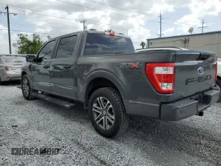 2021 Ford F-150 XL with VIN 1FTEW1CP2MFA66913, listed as a Copart auction lot 60974875 with 85,782 mi miles and Salvage title. Bid and sale history available at DreamBid. Image 2.