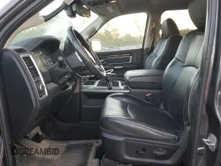 2014 Ram 1500 Longhorn with VIN 1C6RR7PMXES370857, listed as a Copart auction lot 69699954 with 105,590 mi miles and Salvage title. Bid and sale history available at DreamBid. Image 7.
