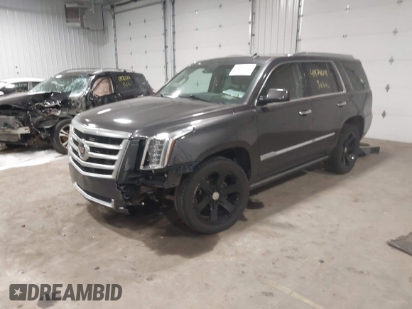 2015 Cadillac Escalade Premium with VIN 1GYS4CKJ8FR308617, listed as a IAAI auction lot 41974608 with 154,014 mi miles and . Bid and sale history available at DreamBid. Image 17.