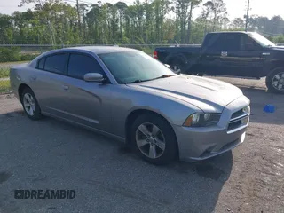 2014 Dodge Charger SE with VIN 2C3CDXBGXEH284832, listed as a IAAI auction lot 42069294 with 186,273 mi miles and . Bid and sale history available at carsss.com. Image 1.