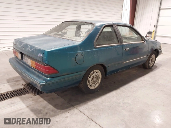 1993 Ford Tempo z VIN 1FAPP31X5PK229656, wystawiony jako IAAI lot #41788568 z przebiegiem 64 620 mil mil oraz . Historia ofert i sprzedaży dostępna na DreamBid. Obrazek 4.