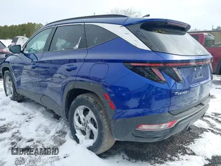 2022 Hyundai Tucson SEL with VIN 5NMJBCAE5NH086584, listed as a IAAI auction lot 41976975 with 22,011 mi miles. Bid and sale history available at carsss.com. Image 3.