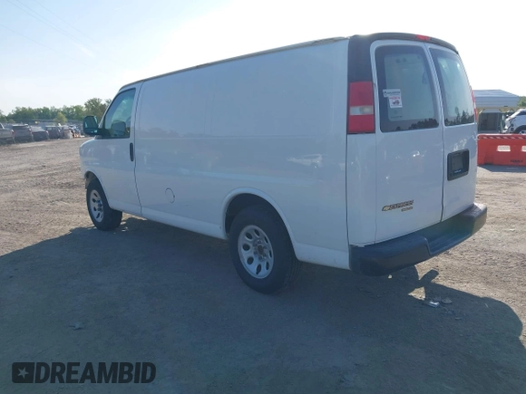 2014 Chevrolet Express Cargo Van with VIN 1GCSGAFX2E1151373, listed as a IAAI auction lot 42045528 with 123,718 mi miles. Bid and sale history available at carsss.com. Image 3.