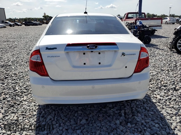 2010 Ford Fusion Hybrid с VIN 3FADP0L3XAR142883, выставлен на аукционе Copart как лот 64308015 с пробегом 67 890 миль миль и Чистый • Clean title. История ставок и продаж доступна на DreamBid. Изображение 6.