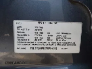 2021 Tesla Model Y Long Range z VIN 5YJYGAEE7MF146315, wystawiony jako IAAI lot #42445336 z przebiegiem 57 110 mil mil oraz . Historia ofert i sprzedaży dostępna na DreamBid. Obrazek 9.