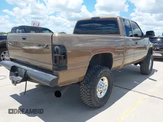 2001 Dodge 2500 z VIN 3B7KF236X1G711561, wystawiony jako IAAI lot #42168089 z przebiegiem 221 062 mil mil oraz . Historia ofert i sprzedaży dostępna na DreamBid. Obrazek 4.