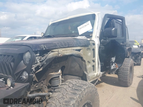 2014 Jeep Wrangler Unlimited Rubicon X with VIN 1C4HJWFG3EL274905, listed as a IAAI auction lot 41512631 with 123,961 mi miles and . Bid and sale history available at DreamBid. Image 6.