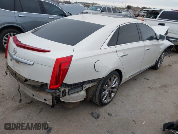 2014 Cadillac XTS Luxury with VIN 2G61M5S35E9303899, listed as a IAAI auction lot 41630891 with 1 mi miles. Bid and sale history available at carsss.com. Image 4.