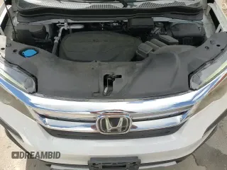 2021 Honda Pilot EX-L z VIN 5FNYF5H54MB026039, wystawiony jako Copart lot #71796535 z przebiegiem 66 339 mil mil oraz Szkoda całkowita • Salvage title. Historia ofert i sprzedaży dostępna na DreamBid. Obrazek 16.