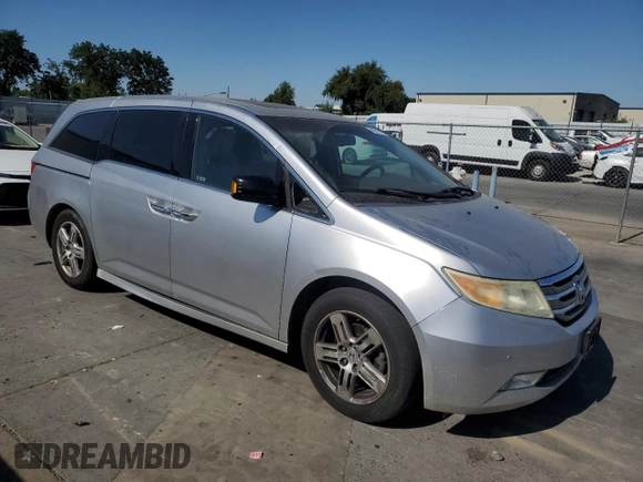 2011 Honda Odyssey Touring с VIN 5FNRL5H92BB063040, выставлен на аукционе Copart как лот 58551765 с пробегом 236 526 миль миль и Списание • Salvage title. История ставок и продаж доступна на DreamBid. Изображение 4.