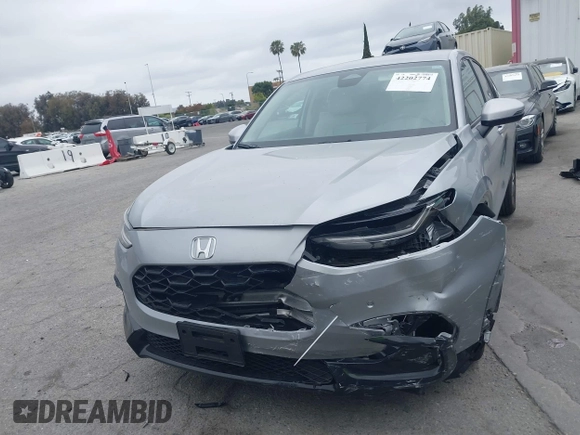 2024 Honda HR-V EX-L z VIN 3CZRZ1H71RM758910, wystawiony jako IAAI lot #42202774 z przebiegiem 8 452 mil mil oraz . Historia ofert i sprzedaży dostępna na DreamBid. Obrazek 13.