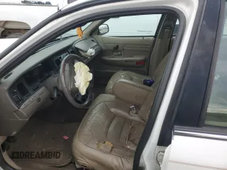 2000 Ford Crown Victoria LX z VIN 2FAFP74W4YX120352, wystawiony jako Copart lot #79833264 z przebiegiem Nie podano mil oraz Szkoda całkowita • Salvage title. Historia ofert i sprzedaży dostępna na DreamBid. Obrazek 7.