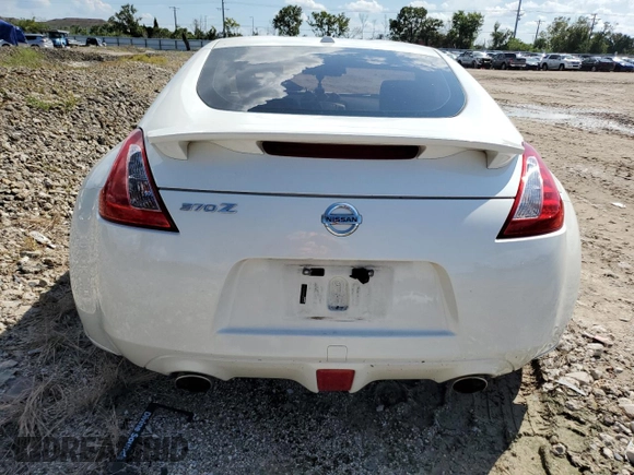 2014 Nissan 370Z Touring with VIN JN1AZ4EH0EM636520, listed as a Copart auction lot 73661434 with 0 mi miles and Salvage Title. Bid and sale history available at carsss.com. Image 6.