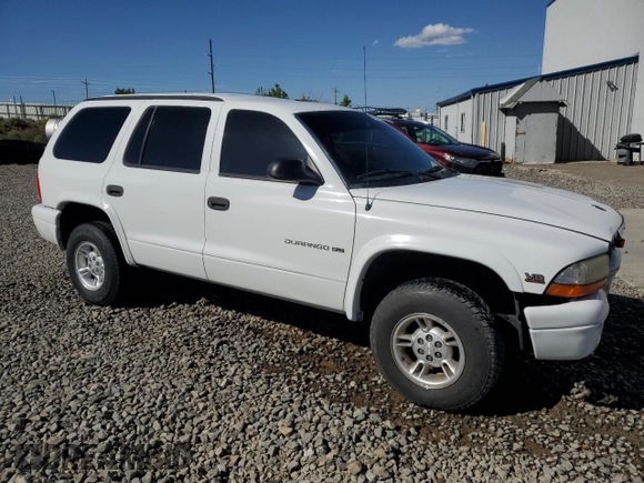 1999 Dodge Durango z VIN 1B4HS28Z6XF649205, wystawiony jako Copart lot #57683305 z przebiegiem 111 561 mil mil oraz Szkoda całkowita • Salvage title. Historia ofert i sprzedaży dostępna na DreamBid. Obrazek 4.