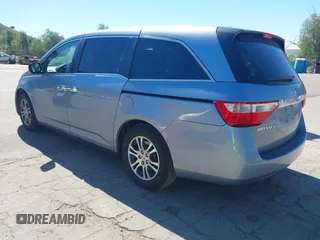 2012 Honda Odyssey EX-L with VIN 5FNRL5H69CB003067, listed as a IAAI auction lot 41862591 with 163,158 mi miles and . Bid and sale history available at carsss.com. Image 3.