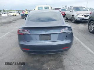 2023 Tesla Model 3 with VIN 5YJ3E1EA4PF410060, listed as a IAAI auction lot 42067624 with 59,934 mi miles and . Bid and sale history available at DreamBid. Image 16.