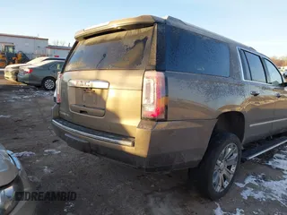 2016 GMC Yukon XL Denali with VIN 1GKS2HKJ8GR432174, listed as a IAAI auction lot 41411844 with 187,258 mi miles and . Bid and sale history available at carsss.com. Image 4.