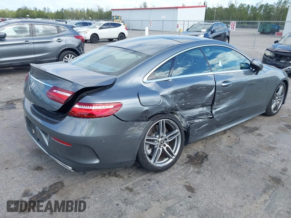 2018 Mercedes-Benz E 400 with VIN WDD1J6FB9JF015064, listed as a IAAI auction lot 42165914 with 95,290 mi miles and . Bid and sale history available at DreamBid. Image 4.
