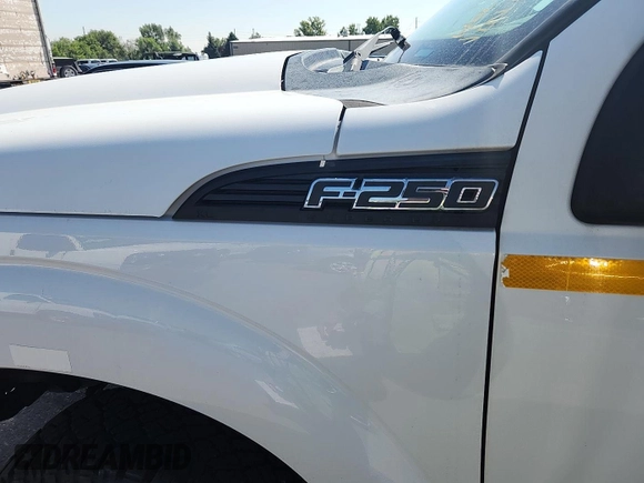 2014 Ford F-250 XL with VIN 1FT7X2B61EEB37353, listed as a IAAI auction lot 42587665 with 123,533 mi miles and . Bid and sale history available at DreamBid. Image 12.