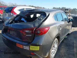 2014 Mazda 3 i Touring with VIN JM1BM1L70E1109815, listed as a IAAI auction lot 41611536 with 98,860 mi miles and . Bid and sale history available at DreamBid. Image 16.